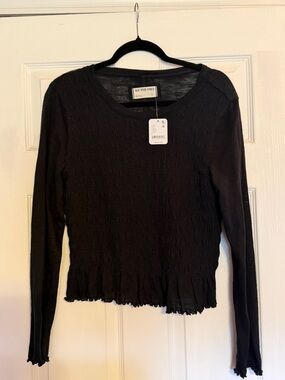 Free People Black Smocked Long-Sleeve Ruffle-Hem Top
